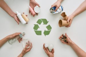 Top,View,Of,Many,Hands,Holding,Different,Waste,,Garbage,Types